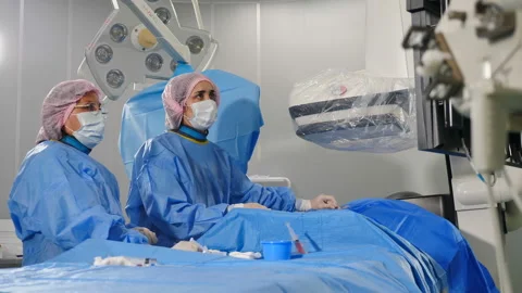 Vascular surgery. Radiologist performs endovascular operation with angiography 스톡 동영상 158421103