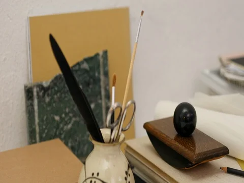 Vase and notebooks Video stock 84712446