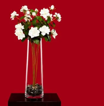 Vase with artificial flowers Stock Photos