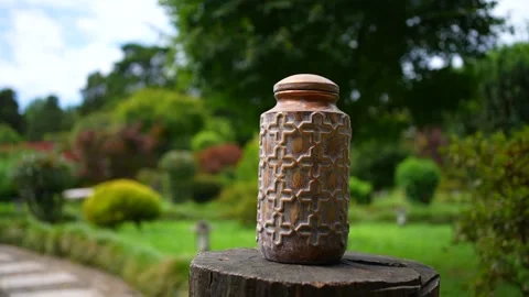 Vase for ashes after cremation in scattering park Video stock 247174458