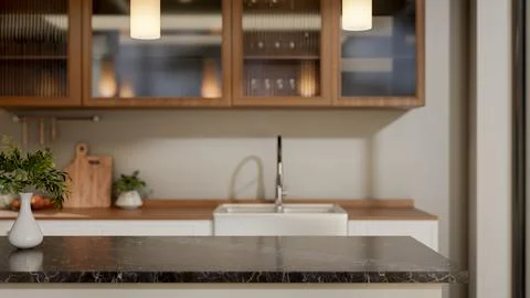 Vase on black marble dining table and a cooking counter with sink under cup.. Illustrazione stock
