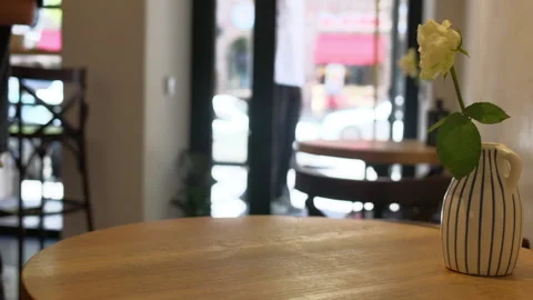 Vase on a cafe table Stock Footage 239168025