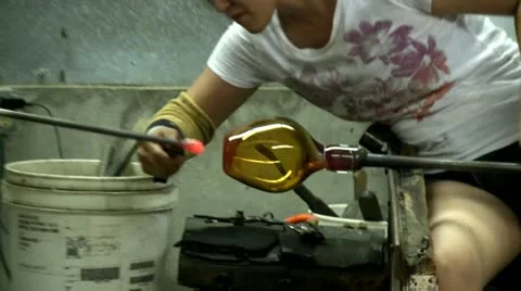 Vase detached from blowpipe Stock Footage 12334183