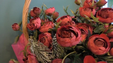 A vase filled with pink flowers on a table Video stock 129579037