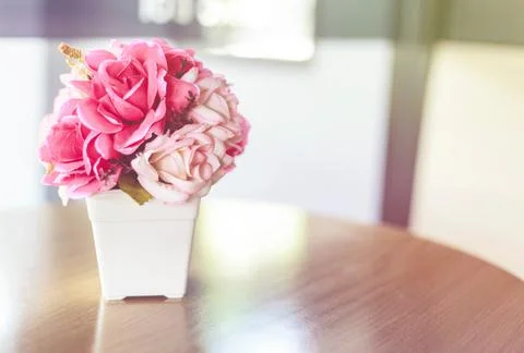 Vase of flower on table Stock Photos