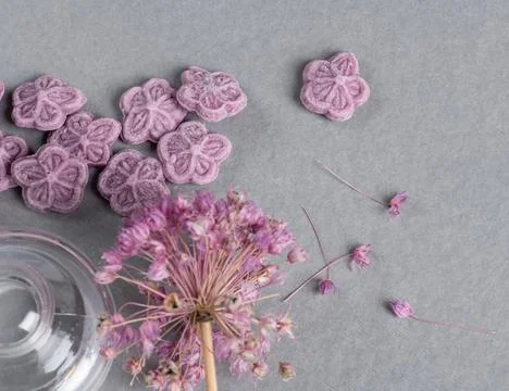 A vase of flowers on a table Stock Photos