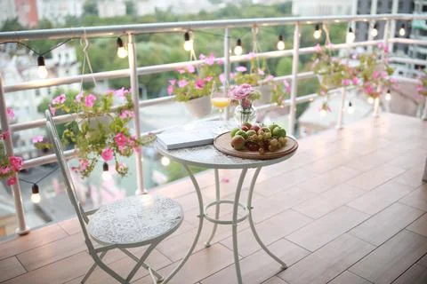 A vase of flowers on a table Stock Photos