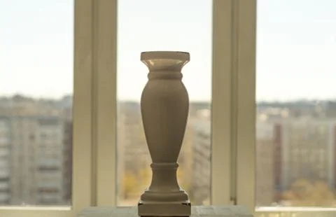 Vase in front of the window Stock Photos