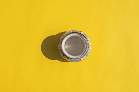 Vase with a hard shadow on a colored background 스톡 사진