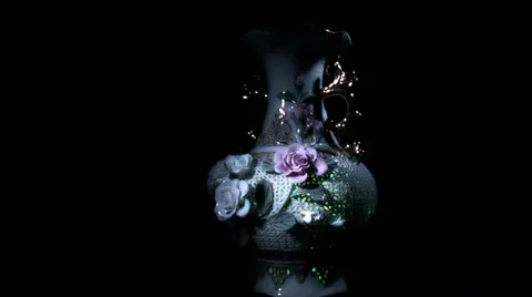 Vase in light of a lamp Stock Footage 12754234