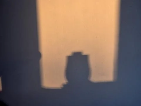 Vase Shadow In The Rays Of Warm Sunset Stock Photos