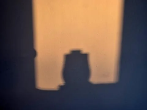 Vase Shadow In The Rays Of Warm Sunset 스톡 사진