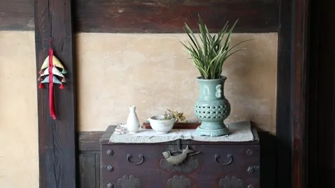 A vase on a shelf 스톡 동영상 310079526