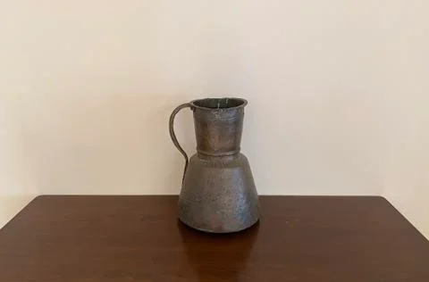 Vase standing on table. Stock Photos