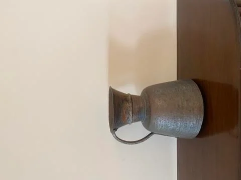 Vase standing on table. Stock Photos