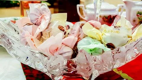 Vase with sweets. Stock Photos