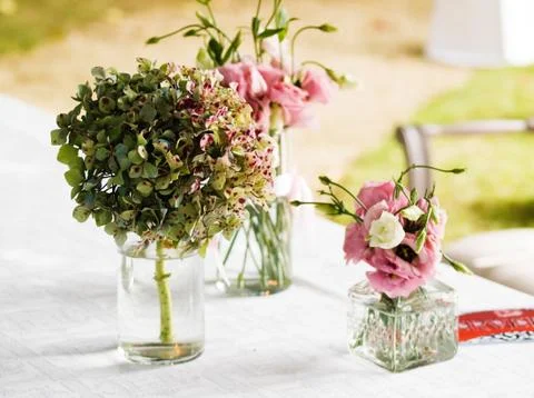 Vases with flowers Stock Photos