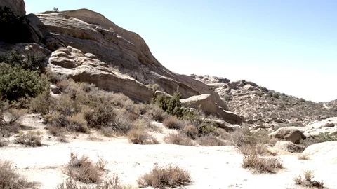 Vasquez Rocks 4K general area terrain pan right V24290 Stock Footage 94738313