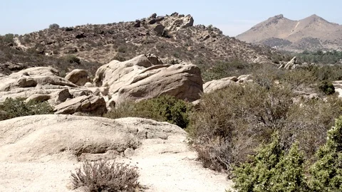 Vasquez Rocks 4K general area terrain pan left V24291 Stock Footage 94738340