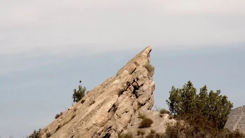 Vasquez Rocks 4K Mini peak and back-area terrain ease out V24328 Stock Footage 94749073