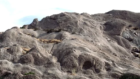 Vasquez Rocks 4K smooth layered formation pan left V24315 Stock Footage 94746987