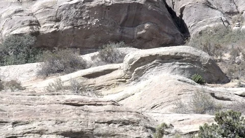 Vasquez Rocks 4K west smooth rocks ease out V24325 Stock Footage 94749072