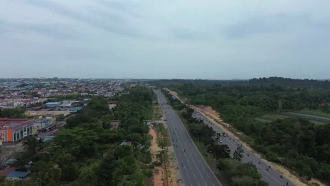 Vast aerial footage capturing an extensive road system connecting bustling .. Video stock 339037272
