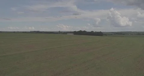 Vast Agricultural Fields Under an Expansive Sky Stock Photos