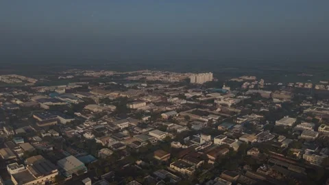 Vast array of flat-roofed warehouses, small manufacturing units, and clustered Vídeo Stock 331116293