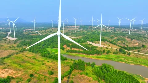 A vast array of towering wind turbines from aerial view drone. Stock Footage 274374894