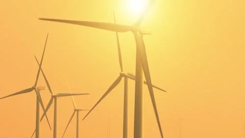 A vast array of towering wind turbines from aerial view drone. Stock Footage 274374984