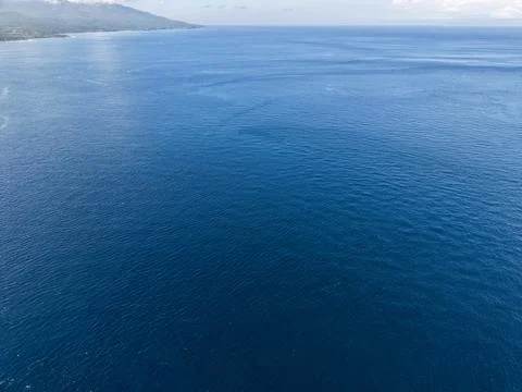 Vast blue ocean and distant horizon view from above in Bali Stock Photos