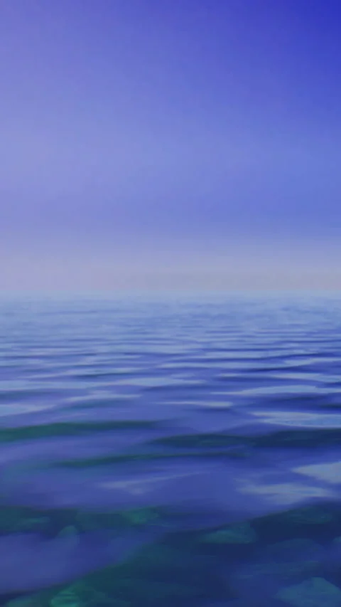 Vast blue ocean with gentle waves under cloudy sky at dawn Stock Footage 332227832