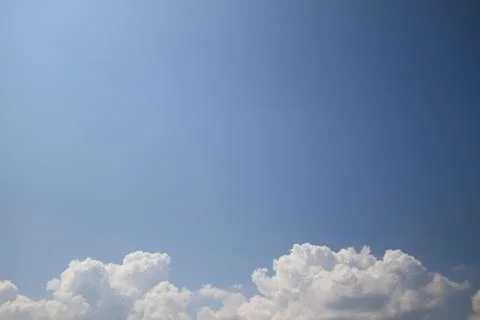 The vast bluesky and clouds for background,Clouds at the bottom of the image  Stock Photos