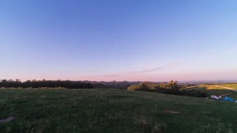 Vast Grassland Landscape Time-lapse with Moving Sunlight and Cloud Shadows Stock Footage 326690530