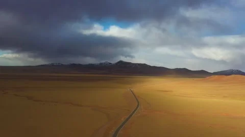 The vast grassland road Stock Footage 243065010