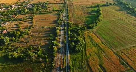 Vast Green Fields Calm Farm Life Vibrant Sunset Scene Of Small Train Passing Stock Footage 300446941