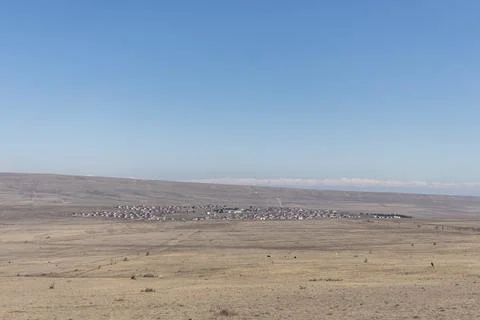 Vast Landscape With Distant Structures Stock Photos