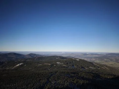 Vast landscape of jested mountain overlooking liberec region in winter Stock Photos