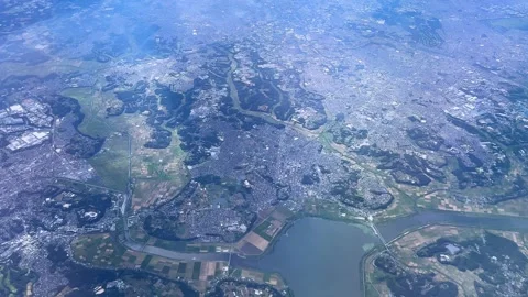 A vast landscape with rivers, cities, and agricultural fields, aerial view Stock Footage 285134992