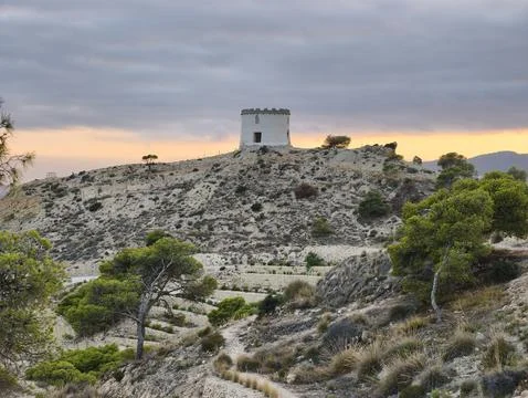 Vast limestone terraces overlooking rolling landscape at dusk Фото