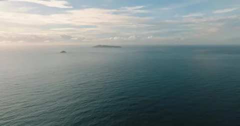 Vast ocean expanse with distant islands on the horizon. Praslin, Seychelles. Stock Footage 302140127