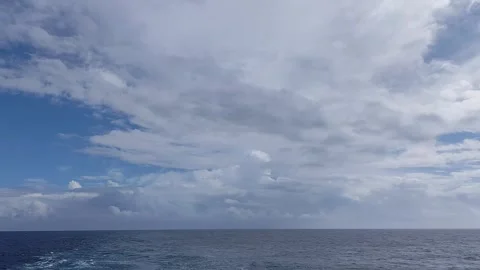 Vast ocean footage with moving clouds and boat wake animation Stock Footage 344368903