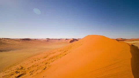 Vast Orange Sand Dunes Under Clear Blue Sky, Wide Shot Stock Footage 341461607