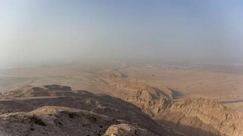 Vast Panoramic View of Deep Desert Canyons and Rugged Mountains Stock Photos