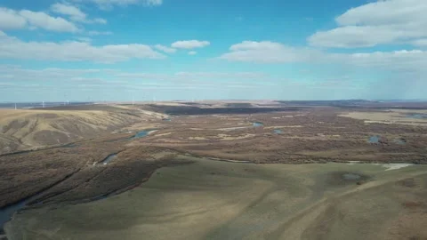 Vast Plateau Beneath Layered Clouds in Inner Mongolia, China Stock Footage 344036803