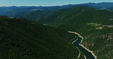 Vast River Basin Flowing Through Forest Covered Mountain Range Meandre Turns Video stock 300491435