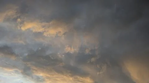 A vast sky with a dramatic cloud formation. The textured clouds are a blend.. Stock Photos