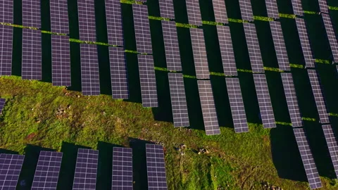 Vast solar panel array basking under the bright sun, showcasing sustainable Stock Footage 331943433