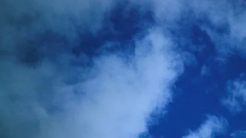 Vast Starry Night Sky and Moody Clouds Evoking Cinematic Mystery Stock Footage 346411308